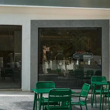 Green chairs on the patio